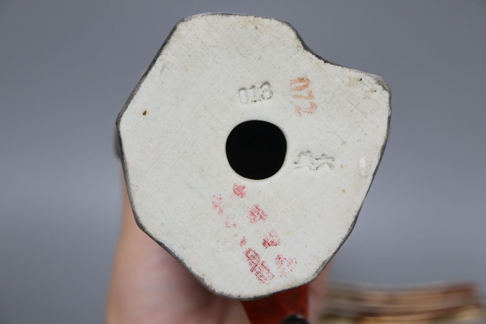 A Chinese yellow ground bowl, a figure, spoon rests etc.